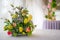 Flowers in birds cage on white table decoration