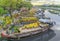 Flowers boats at flower market on along canal wharf