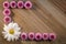 Flowers composition of Pink Chrysanthemums spring concept on wood background flat lay