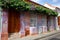 Flowers decorate a purple colonial house in Cartagena