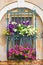 Flowers decorate a window in Venice Italy, Europe