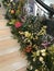 Flowers decoration around the stair railing.