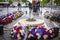 Flowers and eternal flame near Arc de Triomphe in honor of victory over fascism in World War II on