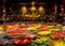 Flowers floating under the golden statue of Buddha