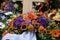 flowers and funeral wreaths on a grave