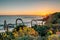 Flowers and the Pacific Ocean at sunset, at Heisler Park, in Laguna Beach, Orange County, California