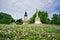 Flowers in park near Nitra`s castle near plaque pillar