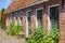 Flowers and plants on the facade of a house in Bourtange