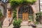 Flowers and plants in front of a half-timbered house