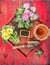 Flowers potting with old scoop , flowers pot and garden sign on red rustic wooden tray