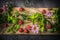 Flowers , raspberries and mint on the wooden board top view