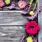 Flowers in a semicircle on a wooden background. Postcard for the holiday. Roses, lavender, sage and hairy chestnuts