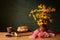 Flowers in a vase, books and cakes