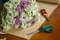 Flowers on the wooden worktop at flower shop