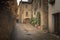 Flowery streets on a rainy spring day in a small magical village Pienza