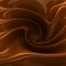 Flowing brown chocolate swirl