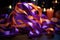 flowing orange and purple halloween-themed ribbons