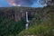 Flowing River in Fitzroy water Falls in Bowral NSW Australia beautiful colourful cloudy skies lovely waterfalls