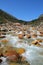 Flowing river in the rocky Riwuqie valley