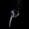 Flowing smoke on black background, white vapor, abstract flow of cigarette smoke, aroma stick smoke