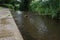 Flowing stream with reflections from Verges