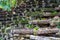 The flowing water sculpture landscape composed of many stone grinding discs in the park