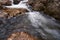 Flowing water in waterfall stream rocks flow