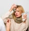 Flu and cold treatment. Girl in scarf examined by doctor. Fever and flu remedies. Woman consult with doctor. Doctor