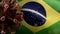 Flu coronavirus floating over Brazilian flag. Pandemic of Covid 19 in Brazil