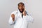 Flu, disease, healthcare and medicine concept. Worried and embarrassed african-american doctor mixed-up prescribtions