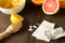 Flu killers - vitamins from citrus, tea with ginger, pills, thermometer and tissues