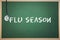 A Flu season against chalkboard