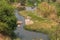 fluent river with rocks and vegetation in Africa. Lubango. Angola.