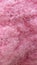 Fluffy bright pink texture wool background