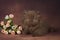 Fluffy chocolate british kitten on a brown background with flowers