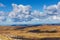 Fluffy clouds casting beautiful shadows on Australian Alps Lands