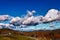 Fluffy Clouds over Autumn Colors