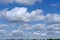 Fluffy clouds over blue sky. summer weather