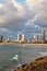 The fluffy clouds over hotels of quay in Tel Aviv