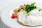 Fluffy Egg White Omelette with rukola, cheese and cherry tomatoes. White dish. Without yolk.