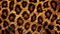 Fluffy faux fur with leopard print. Fashionable background. Top view of spotted fur. Generative AI