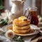 Fluffy Golden Pancakes with Maple Syrup on Vintage Plate