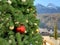 Fluffy high green Christmas tree decorated with various toys