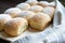 Fluffy homemade austrian powdered buchteln decorated on wooden board