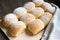 Fluffy homemade austrian powdered buchteln decorated on wooden board