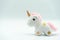 Fluffy unicorn plush kid toy isolated on white