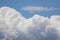 fluffy white cumulonimbus clouds and the blue sky in summer idea