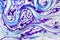 Fluid art marbling texture background with fusion effect and splashes ink