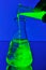 Fluorescent liquid falling in flask