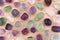 Fluorite rare jewel stones texture on varnished wood background